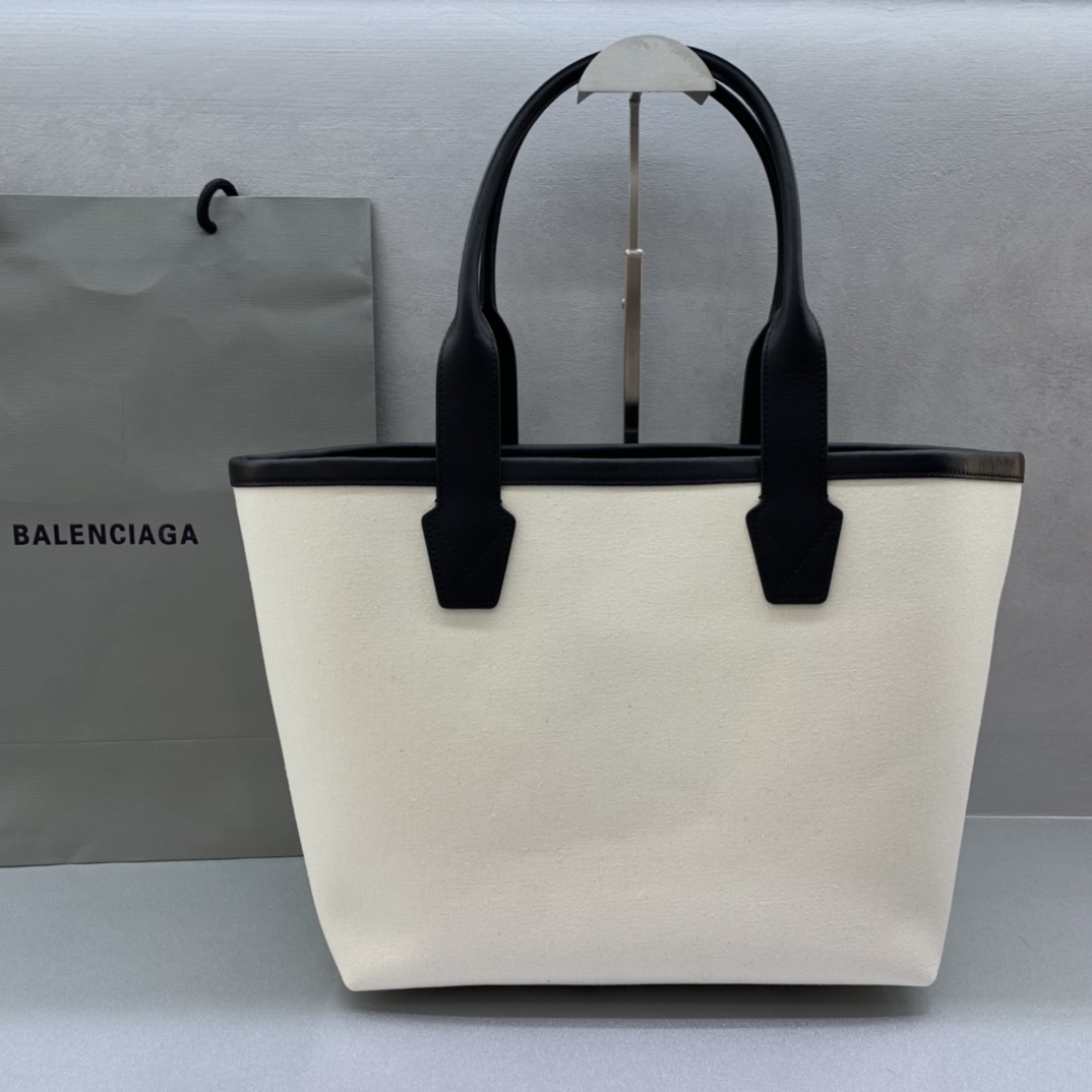 Balenciage Cities Paris Jumbo Large Tote Bag in beige and black cotton canvas and calfskin