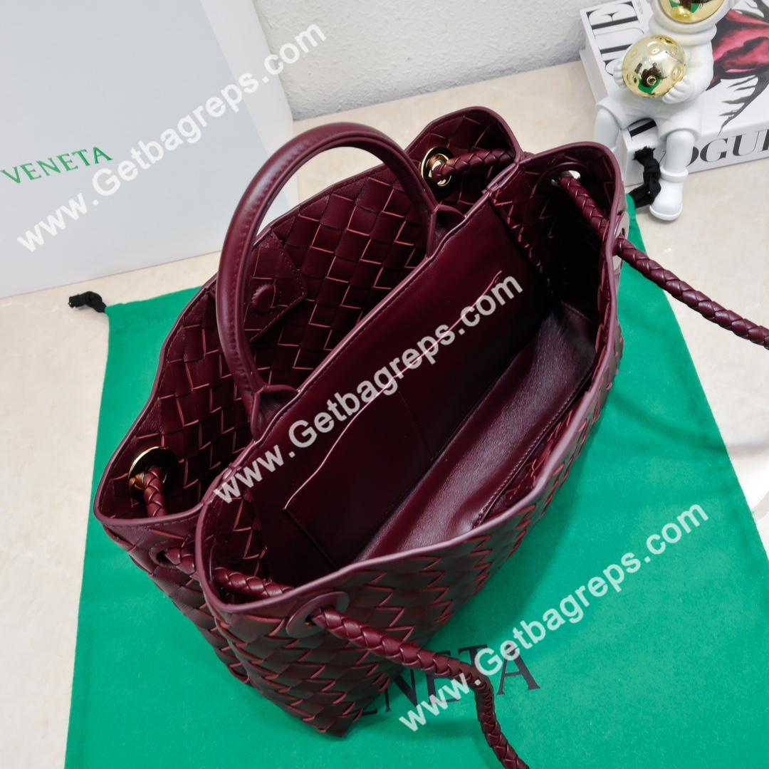 Bottega Veneta 29cm East-West Andiamo Top Handle Bag in Supple Intrecciato Leather Wine