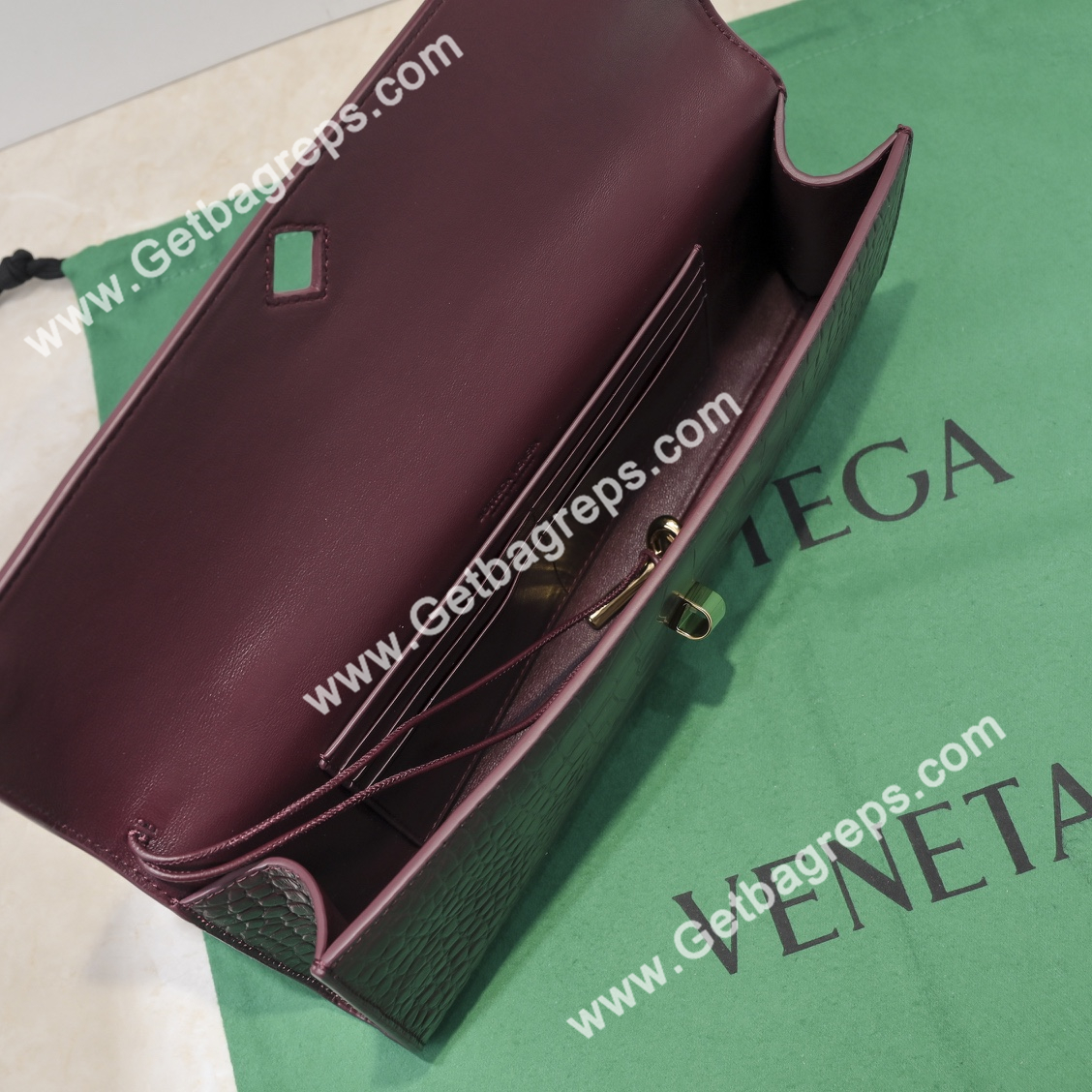 Bottega Veneta Andiamo Clutch Top Handle Clutch in Crocodile Dark Red