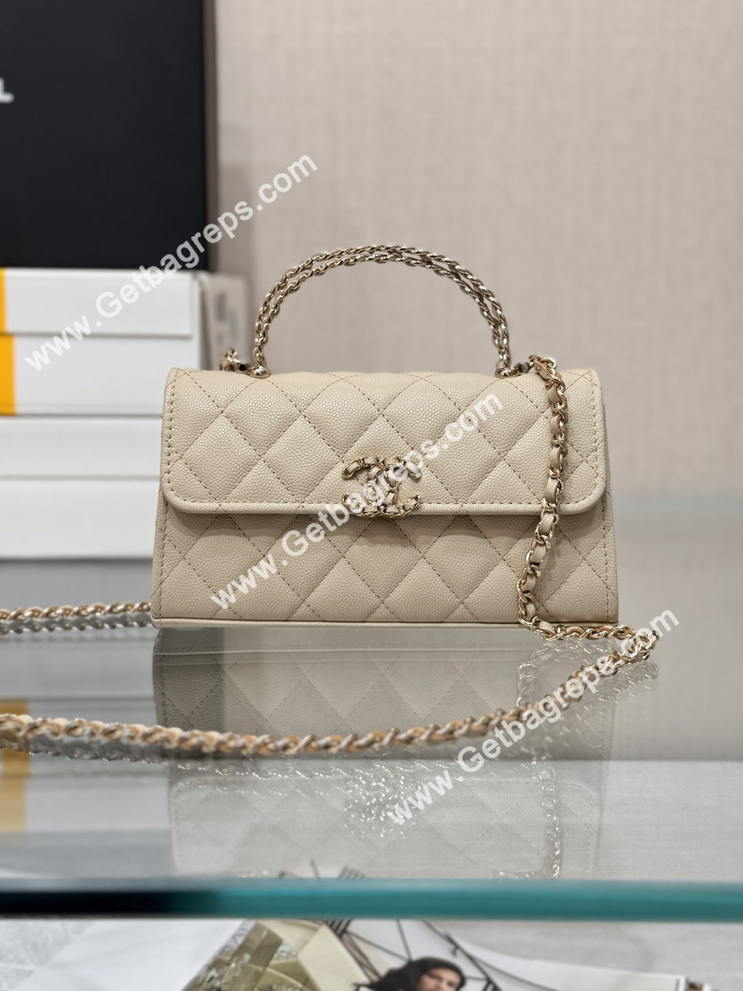 CHANEL Top Handle Phone Holder With Chain Beige Caviar Quilted