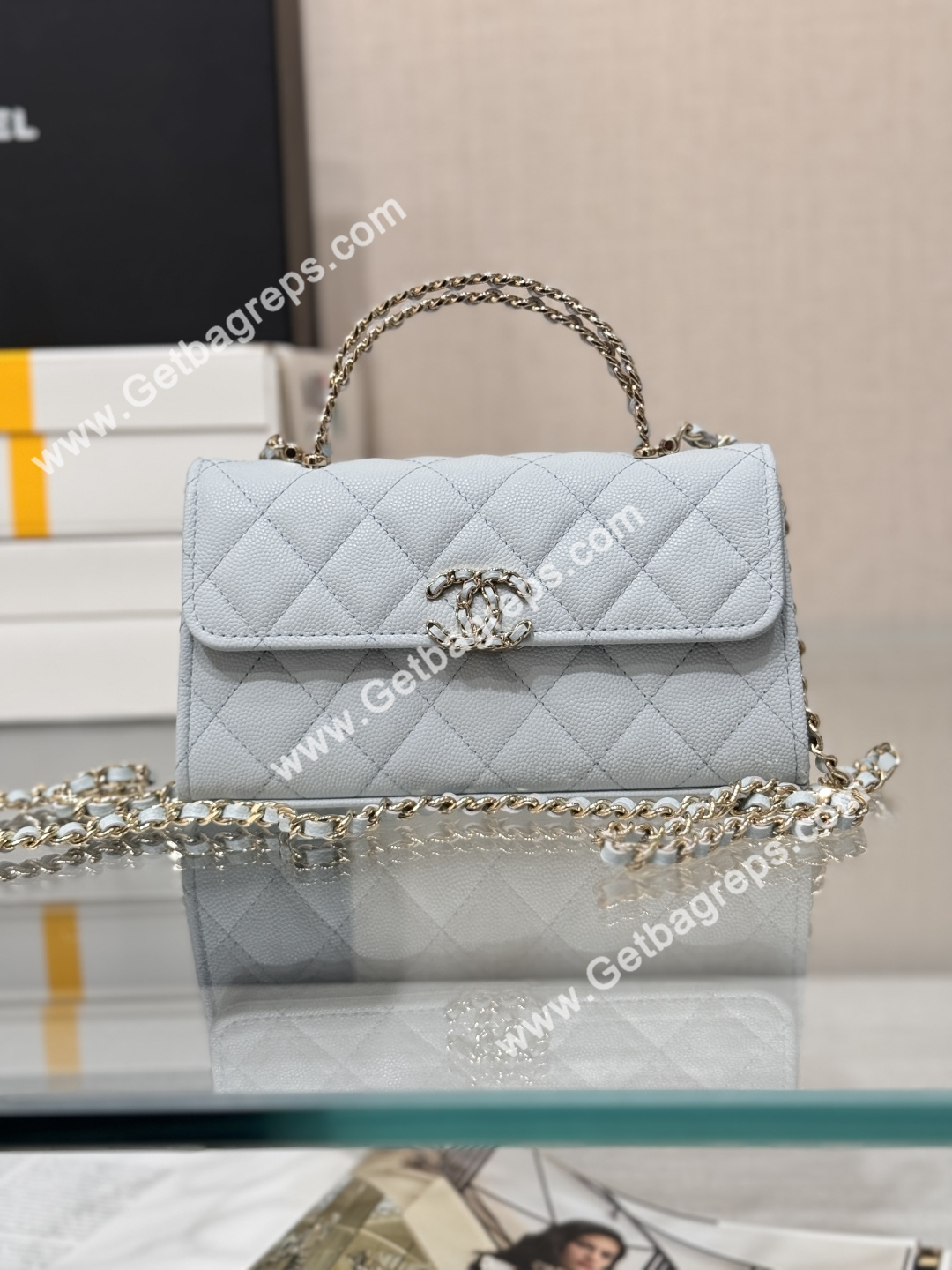 CHANEL Top Handle Phone Holder With Chain Light Blue Caviar Quilted