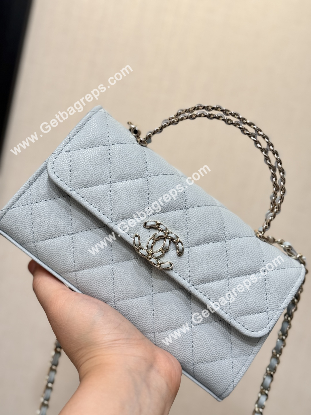 CHANEL Top Handle Phone Holder With Chain Light Blue Caviar Quilted