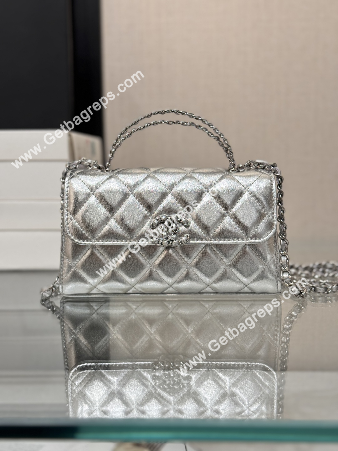 CHANEL Top Handle Phone Holder With Chain Silver Caviar Quilted