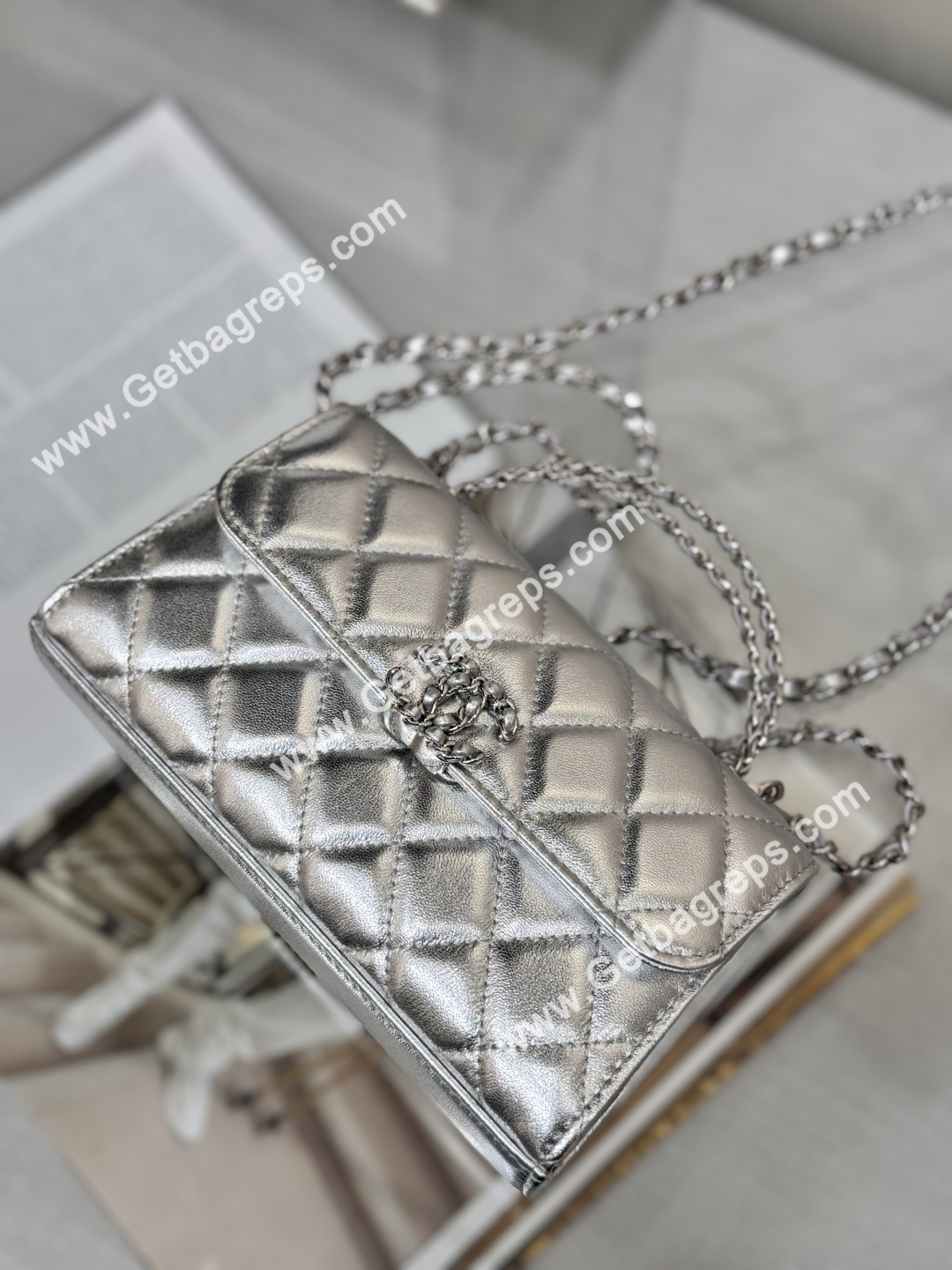 CHANEL Top Handle Phone Holder With Chain Silver Caviar Quilted