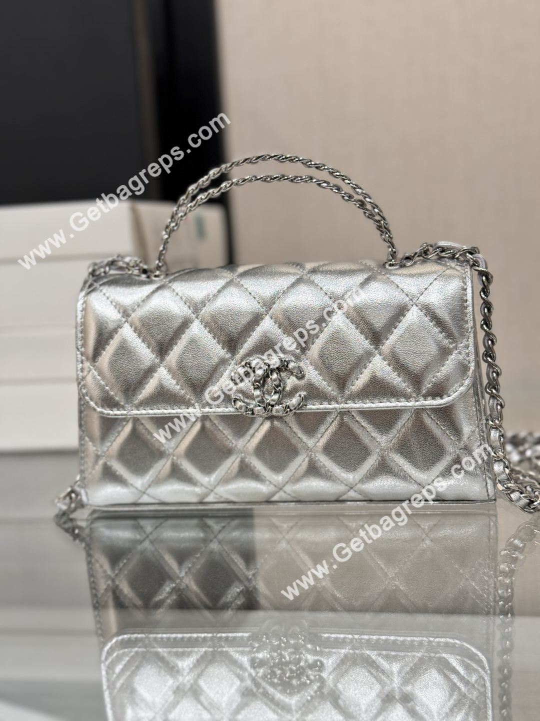 CHANEL Top Handle Phone Holder With Chain Silver Caviar Quilted