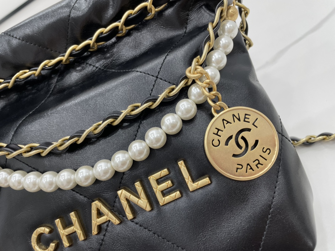 Chanel 22 Hanbag Black Calfskin With Black-Tone Metal With Pearl Shoulder Strap Mini Size 18cm