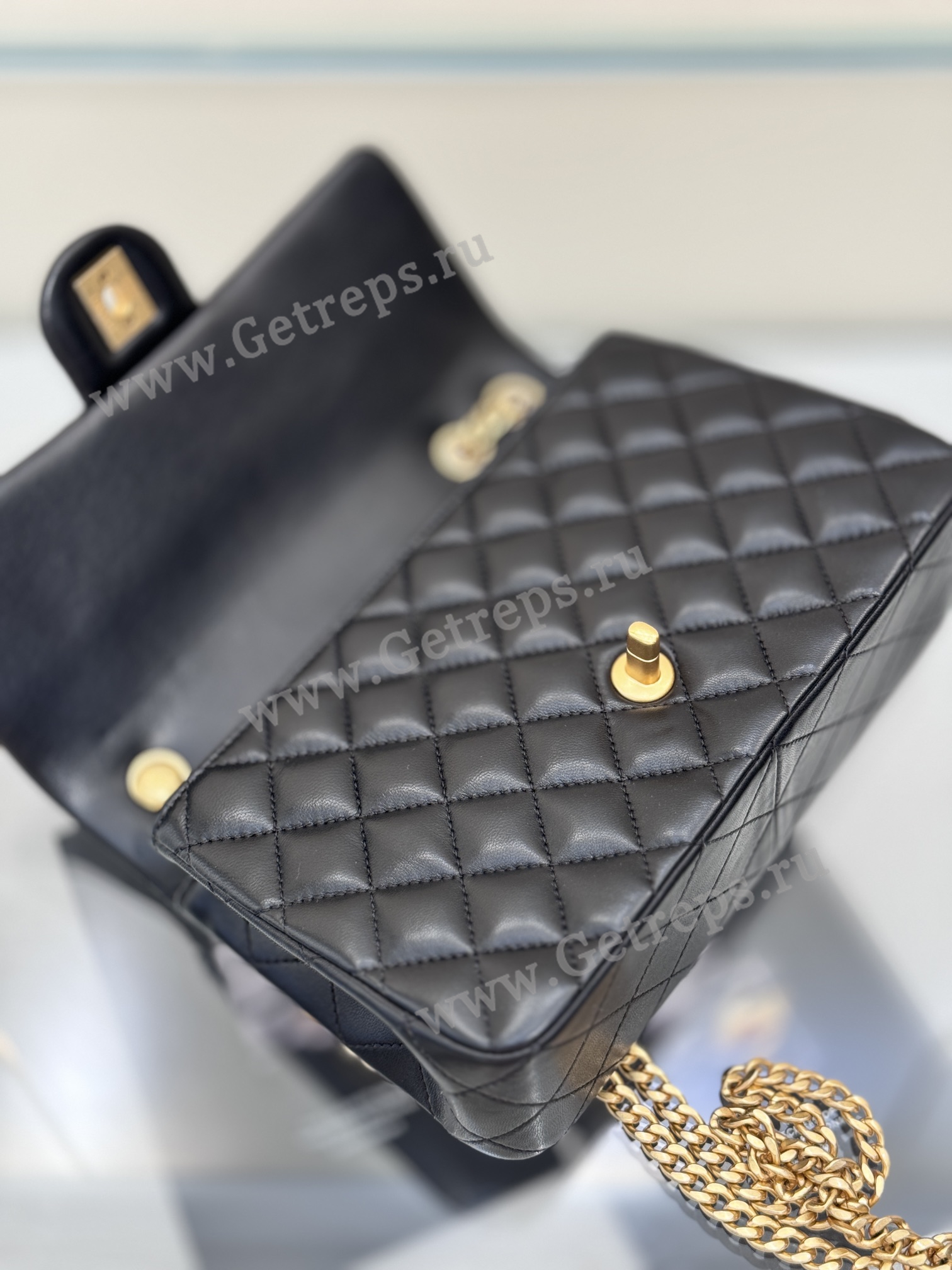 Chanel Classic Flap Bag with Camellia Adjustment Buckle 23.5cm