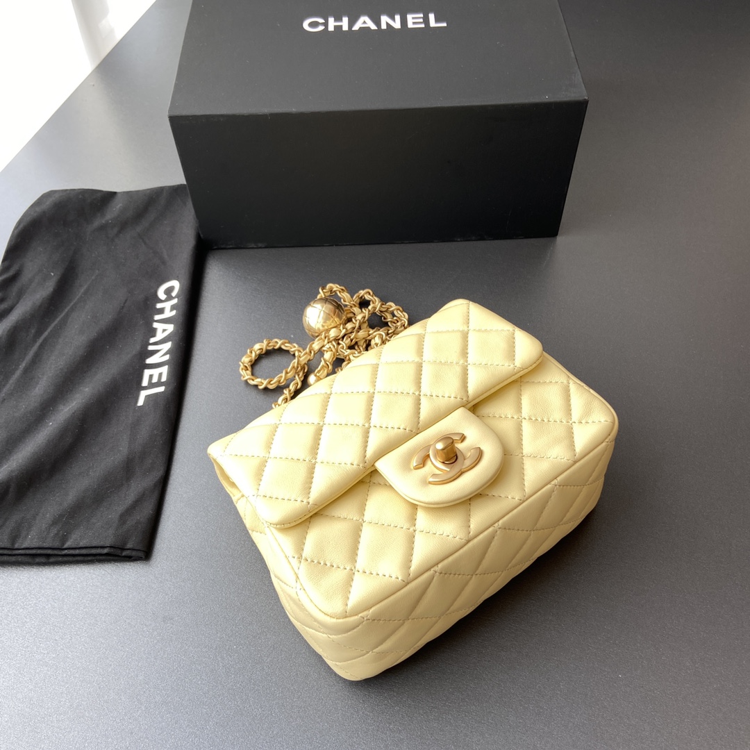 Chanel Mini Flap Bag with Aged Gold Hardware with Quilted CC Toggle Ball Yellow