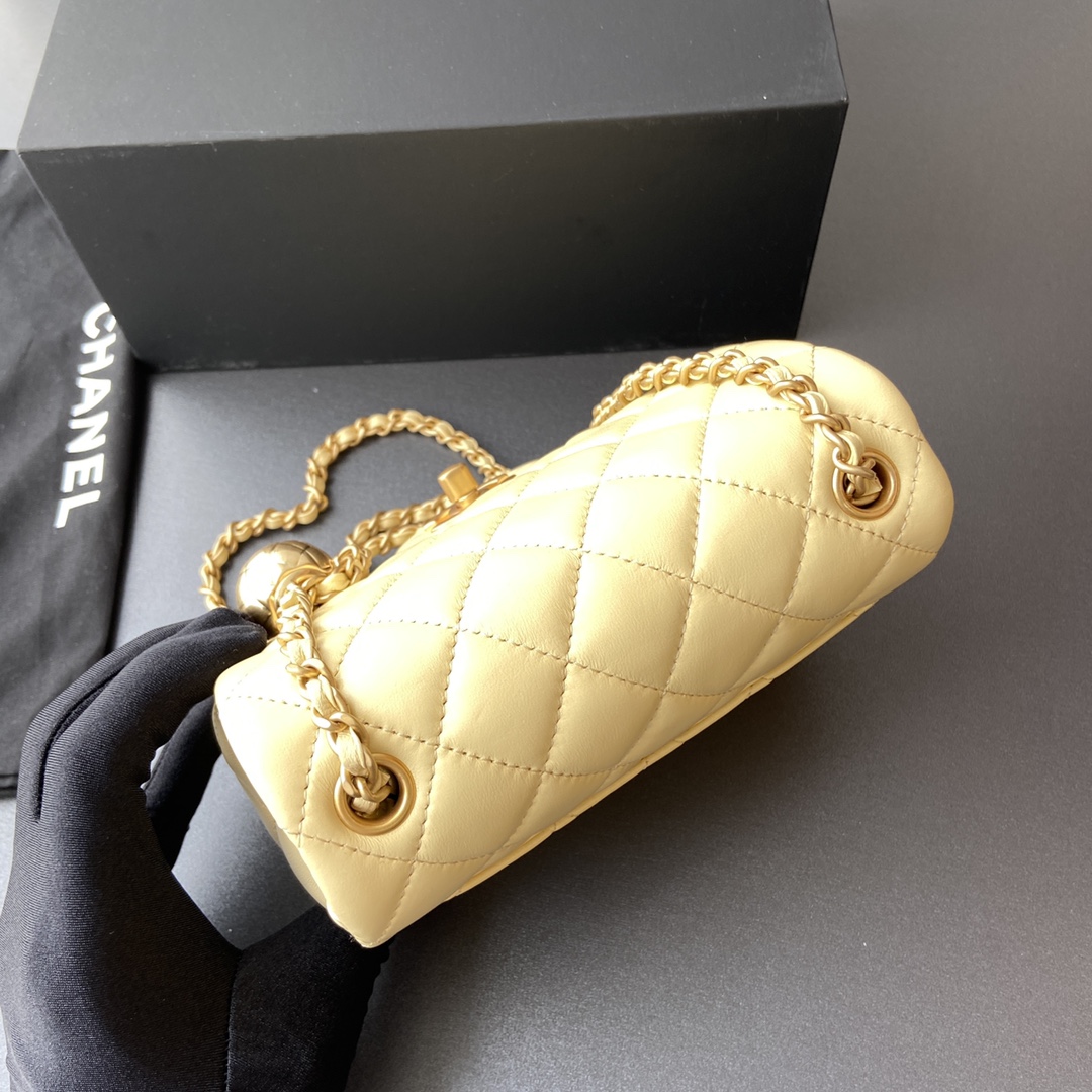 Chanel Mini Flap Bag with Aged Gold Hardware with Quilted CC Toggle Ball Yellow