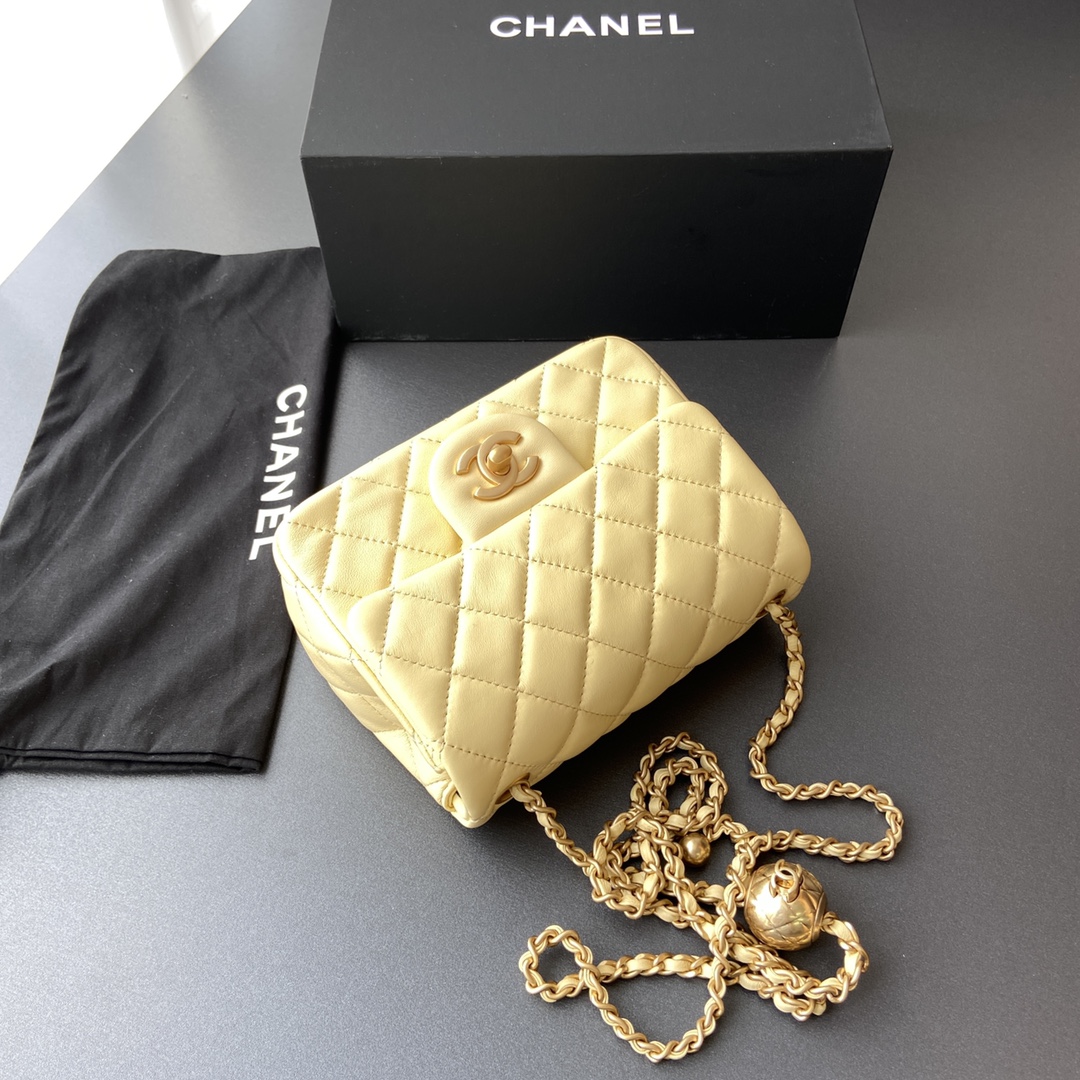 Chanel Mini Flap Bag with Aged Gold Hardware with Quilted CC Toggle Ball Yellow