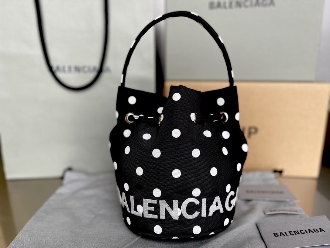 Copy Balenciaga Wheel XS Drawstring Bucket Bag in Black and wWhite Printed Recycled Nylon