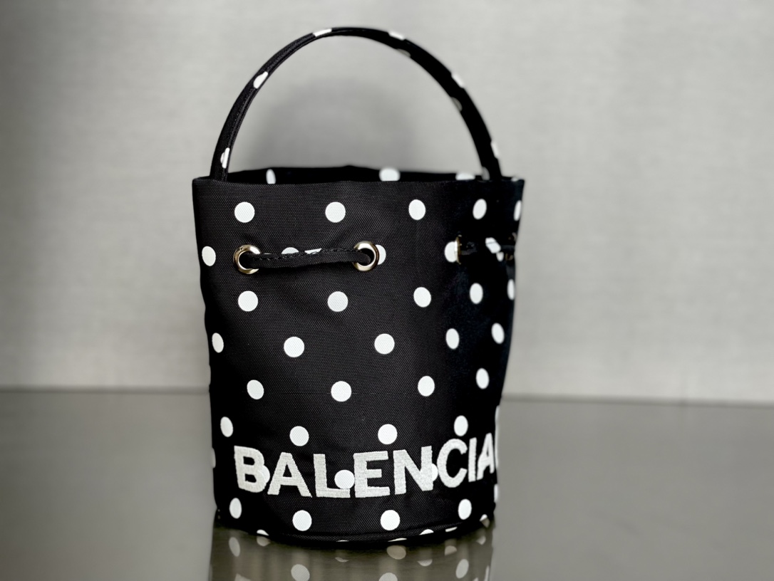 Copy Balenciaga Wheel XS Drawstring Bucket Bag in Black and wWhite Printed Recycled Nylon