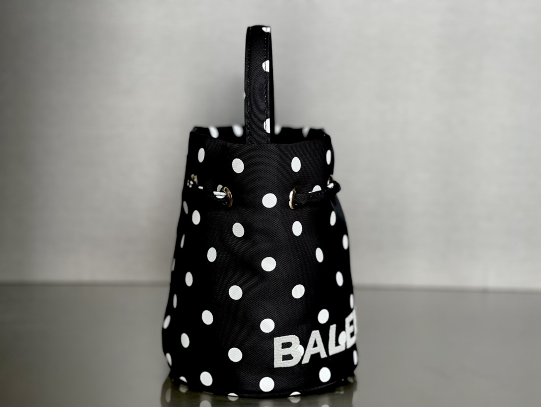 Copy Balenciaga Wheel XS Drawstring Bucket Bag in Black and wWhite Printed Recycled Nylon