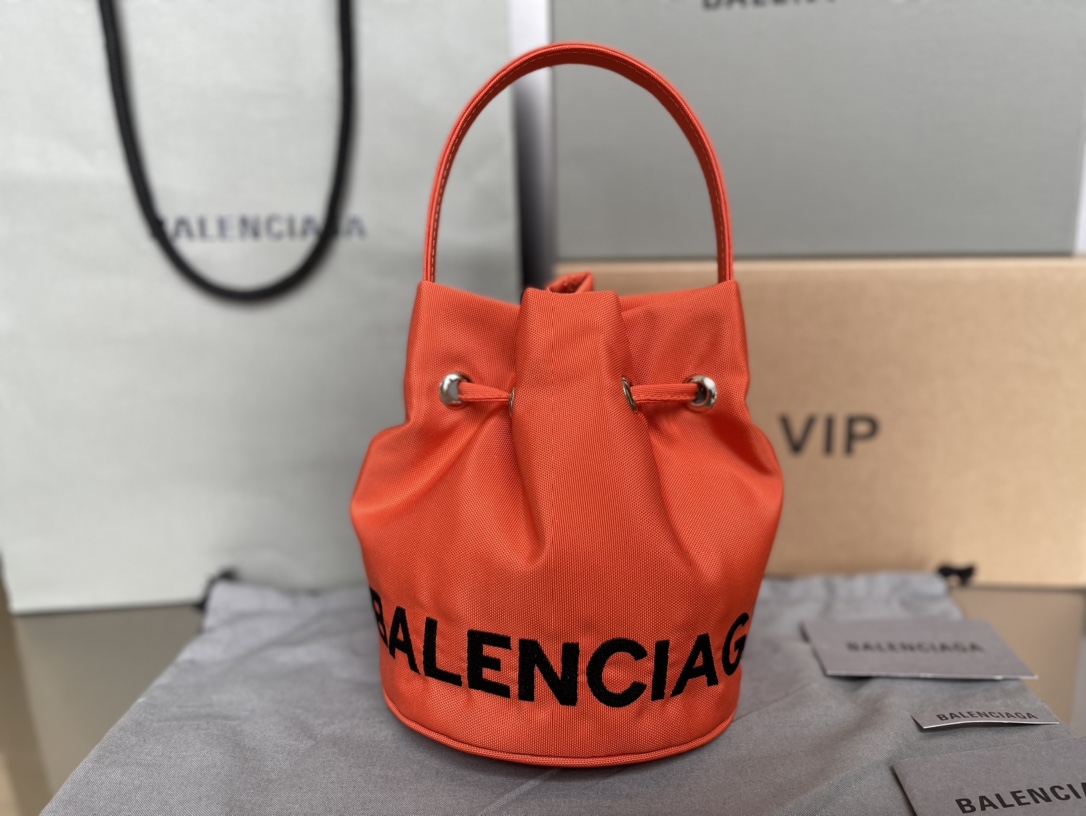 Copy Balenciaga Wheel XS Drawstring Bucket Bag in Orange