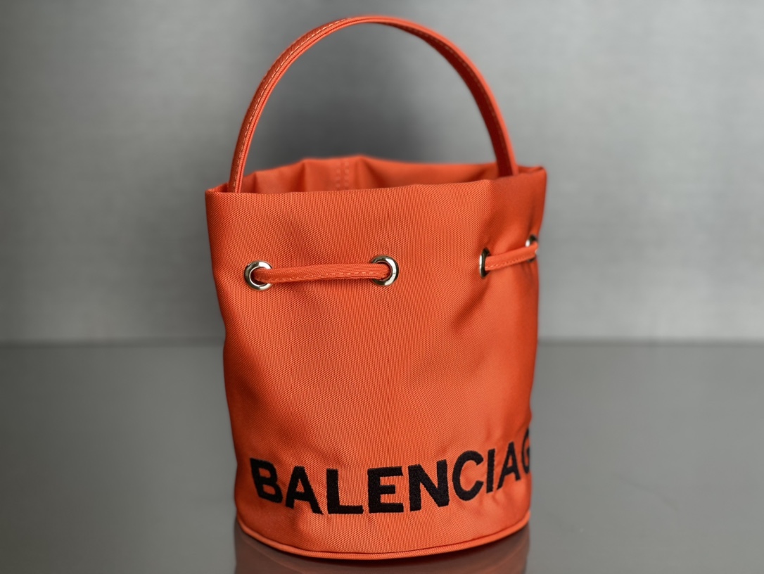 Copy Balenciaga Wheel XS Drawstring Bucket Bag in Orange