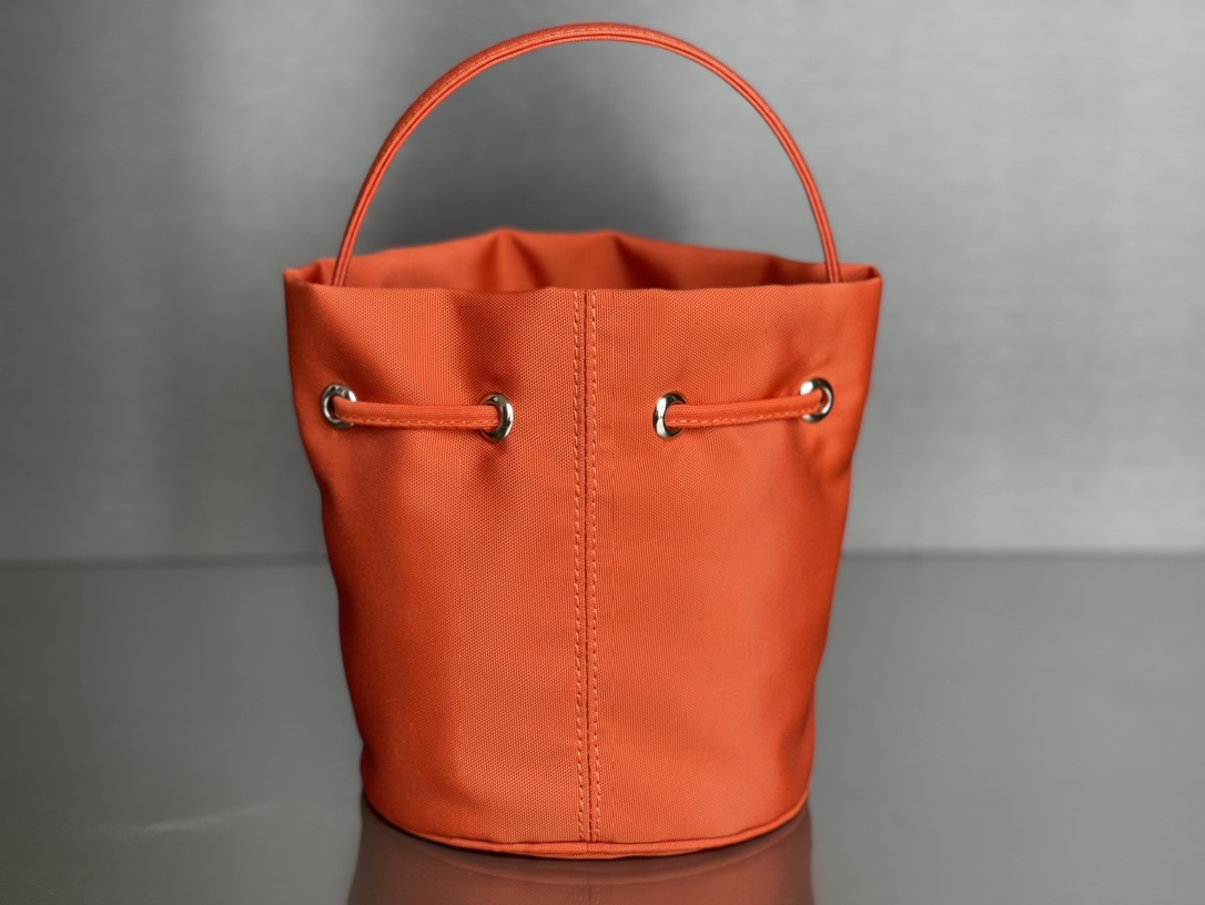 Copy Balenciaga Wheel XS Drawstring Bucket Bag in Orange