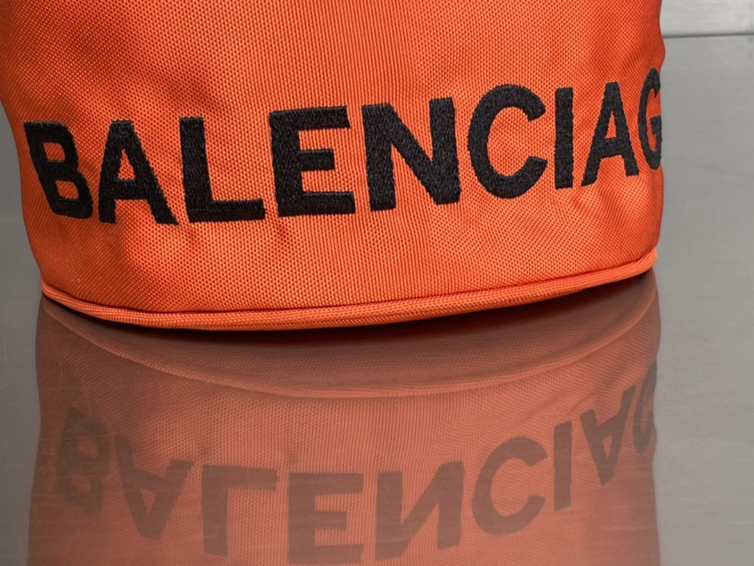 Copy Balenciaga Wheel XS Drawstring Bucket Bag in Orange