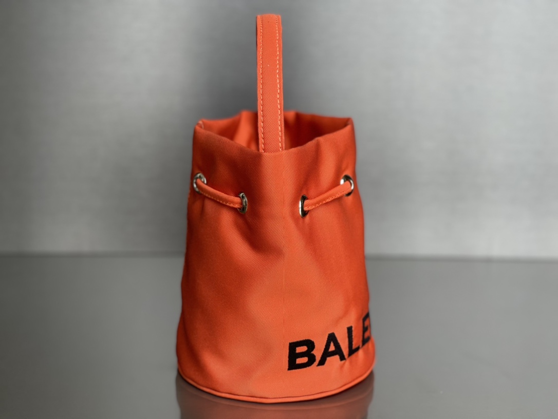 Copy Balenciaga Wheel XS Drawstring Bucket Bag in Orange