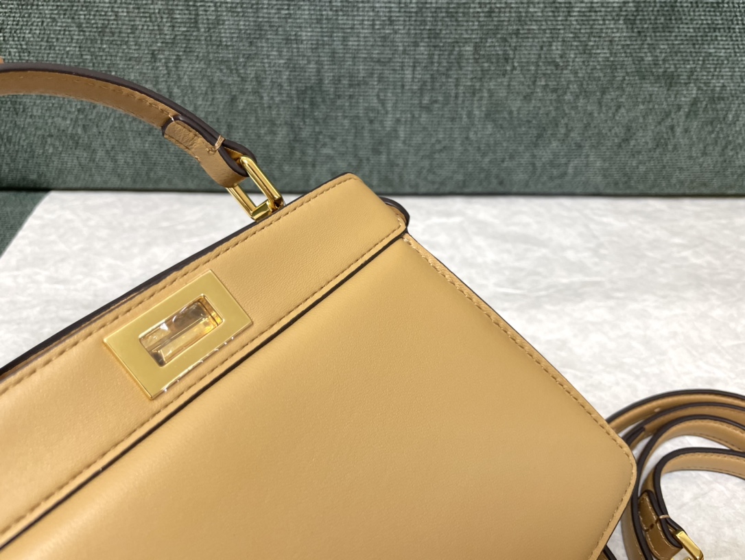 Fendi Peekaboo Iseeu Small Embellished with the Classic Twist Lock on Both Sides Beige Leather