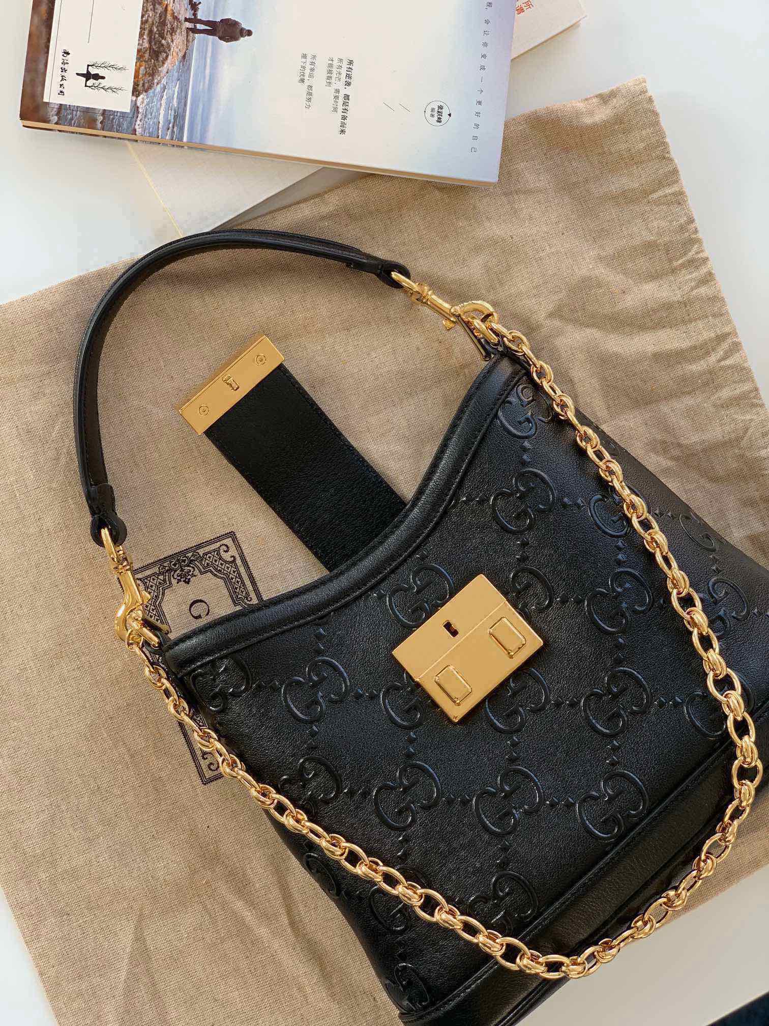 Gucci 675788 Small GG Shoulder Bag Black Debossed GG Leather