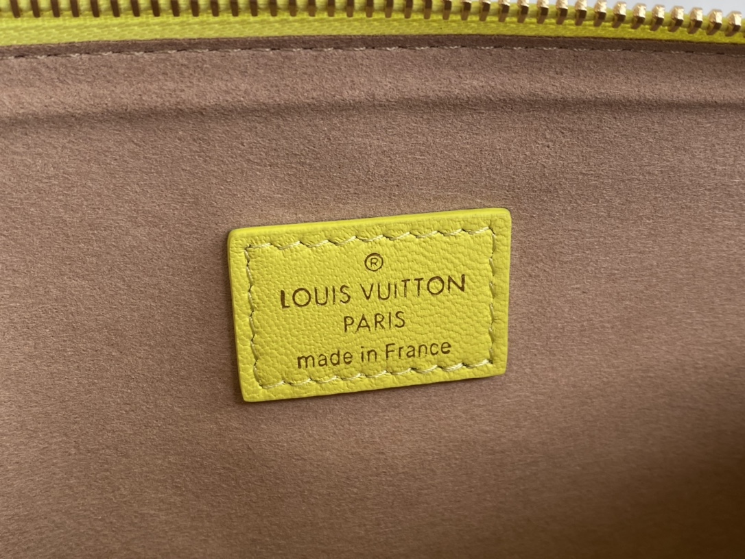 Louis Vuitton COUSSIN PM Handbag Monogram-embossed puffy lambskin Yellow M20843