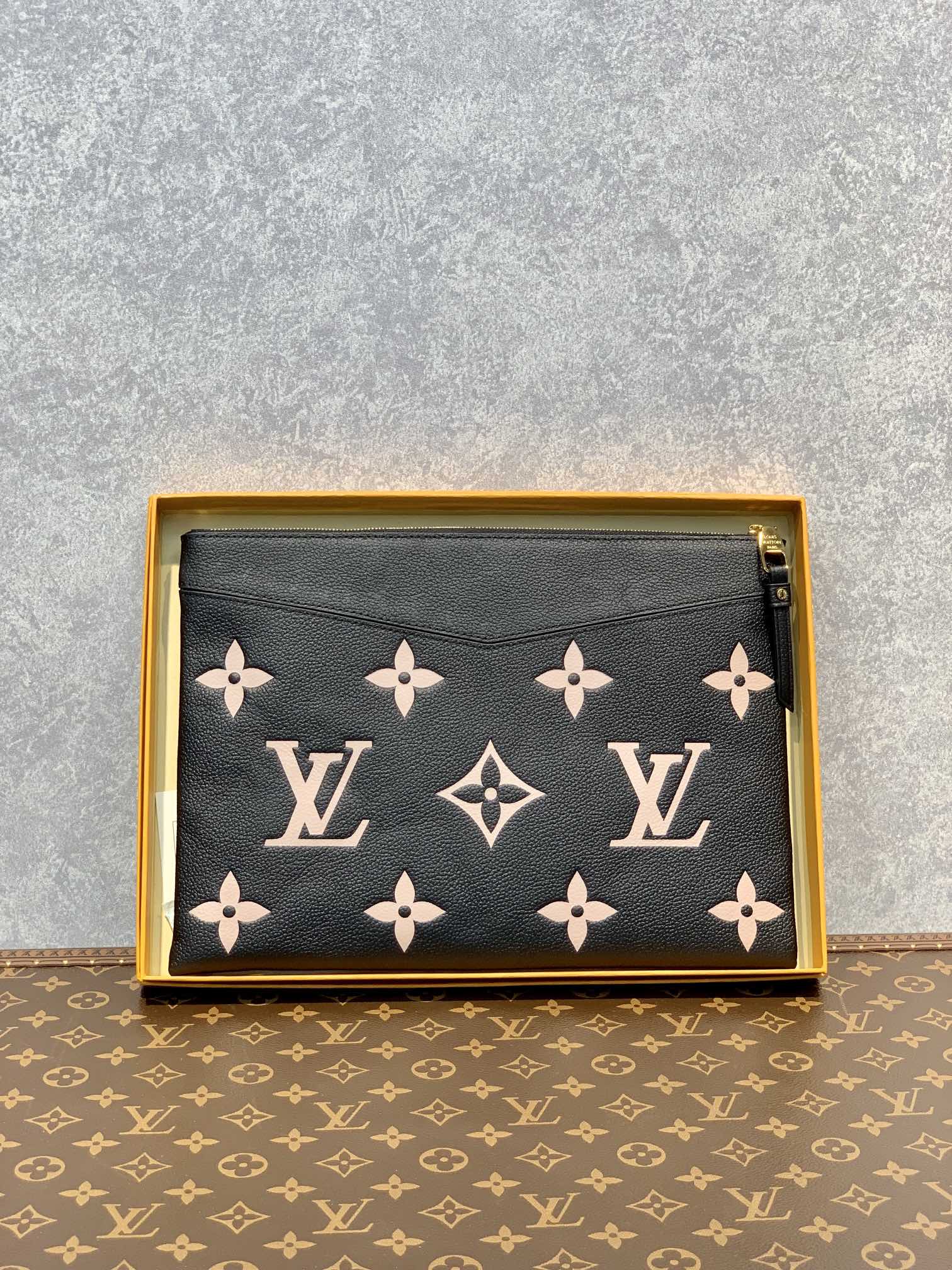 Louis Vuitton Daily Pouch Monogram Empreinte embossed supple grained cowhide leather M81292