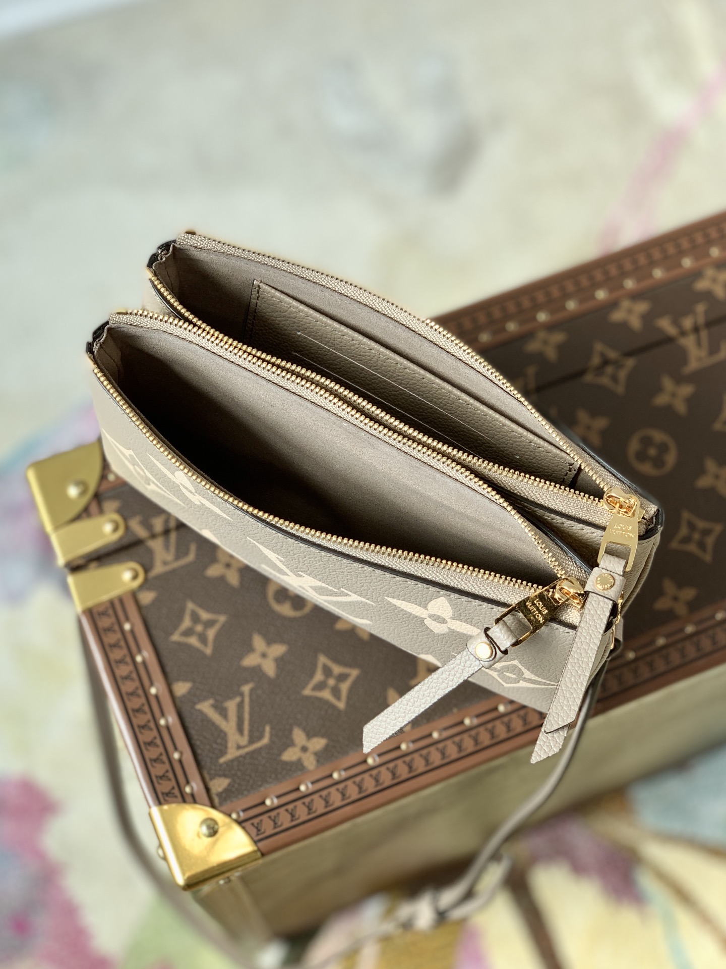 Louis Vuitton Double Zip Pochette Monogram Empreinte Embossed Supple Grained Cowhide Leather M69203