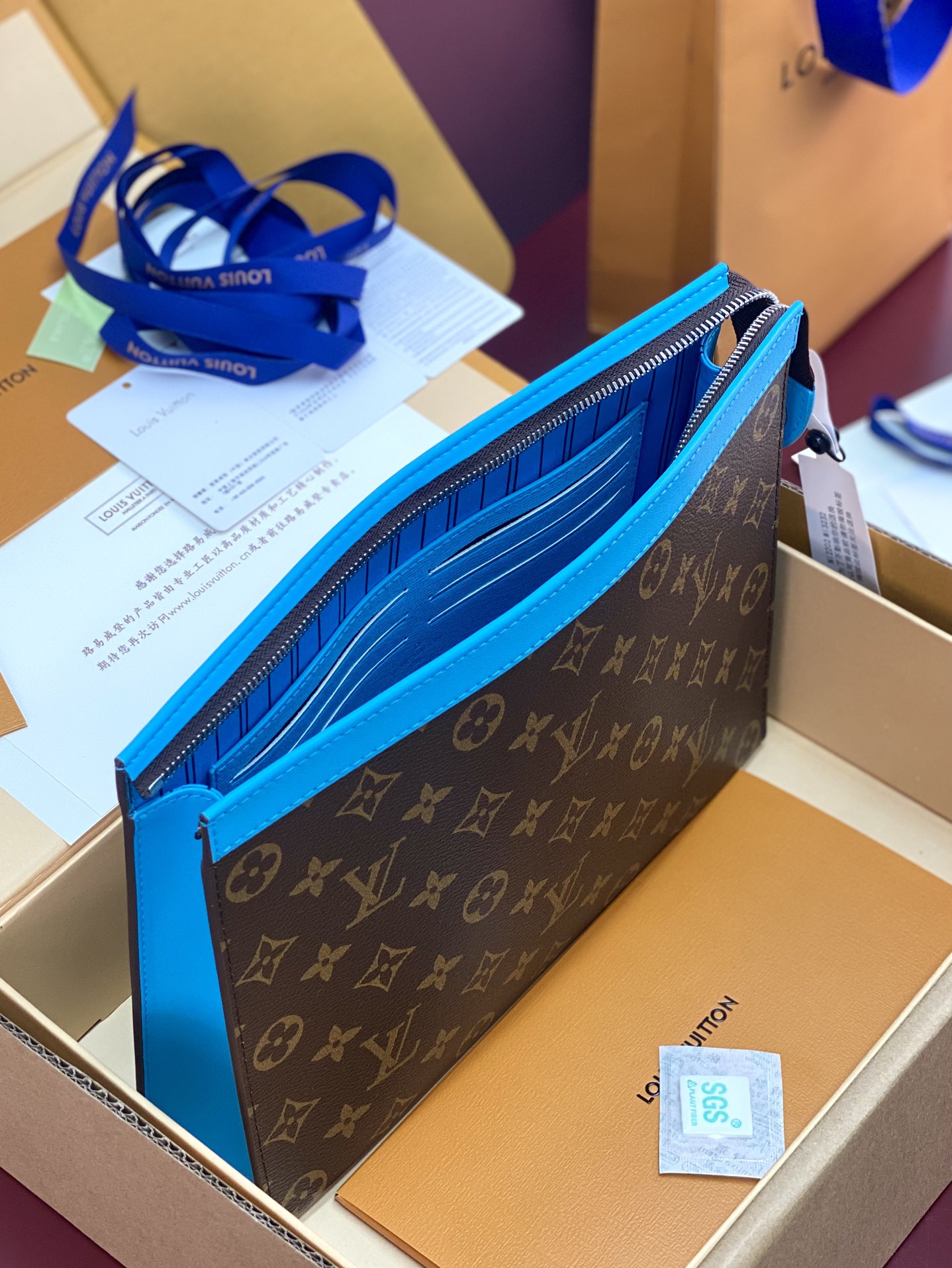 Louis Vuitton M12820 Pochette Voyage MM Monogram Macassar coated canva Blue