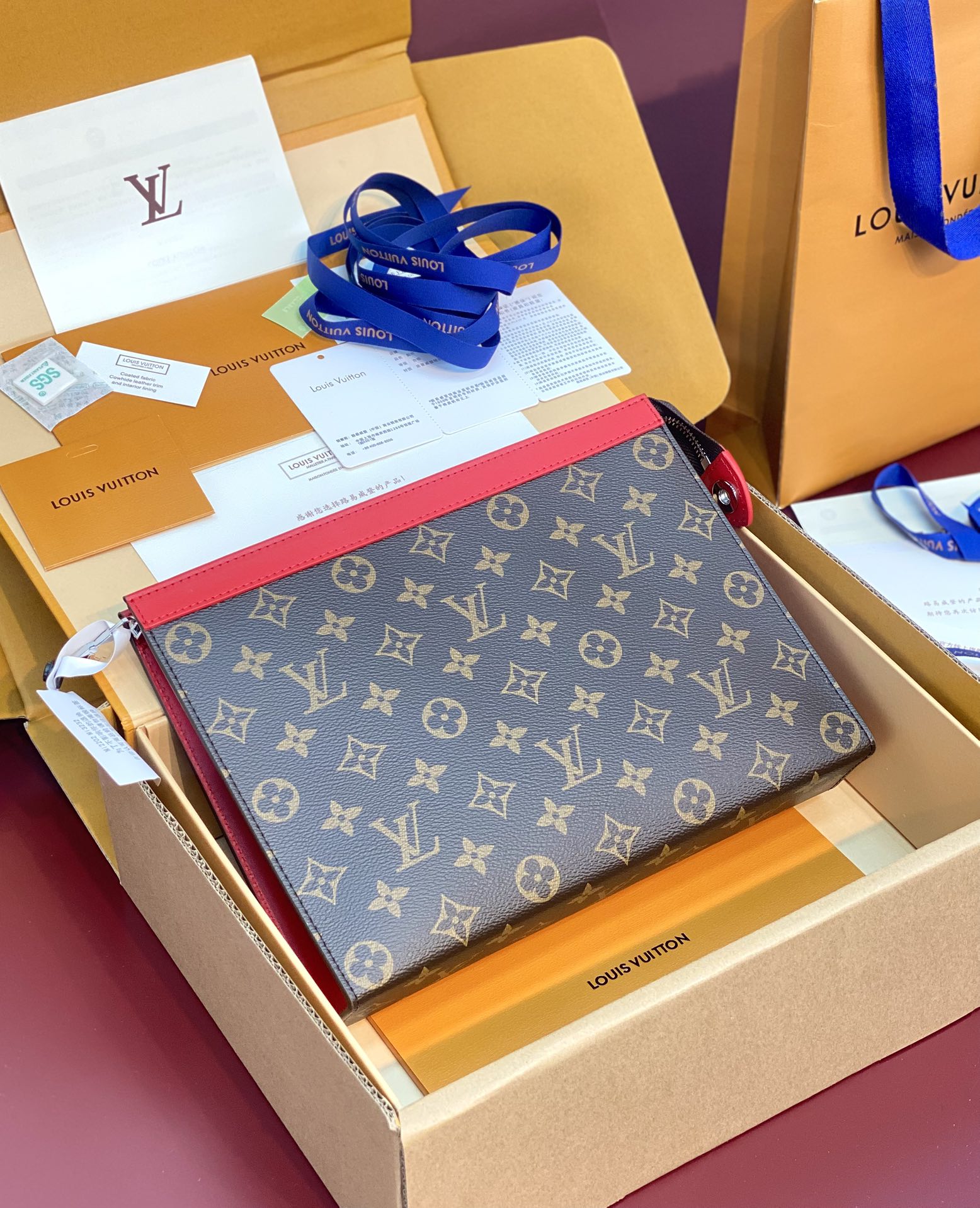 Louis Vuitton M12820 Pochette Voyage MM Monogram Macassar coated canva Red