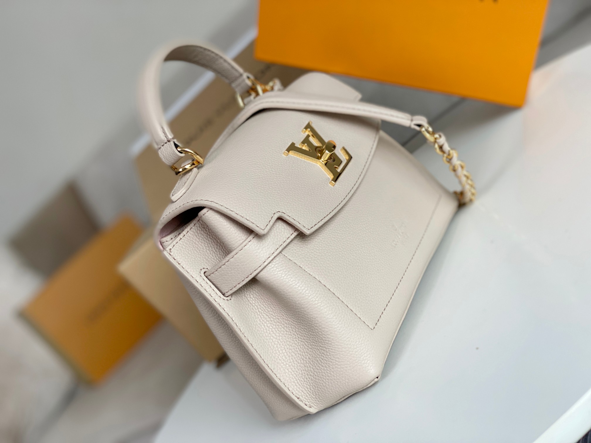 Louis Vuitton M21052 LockMe Ever Mini Greige Grained calf leather