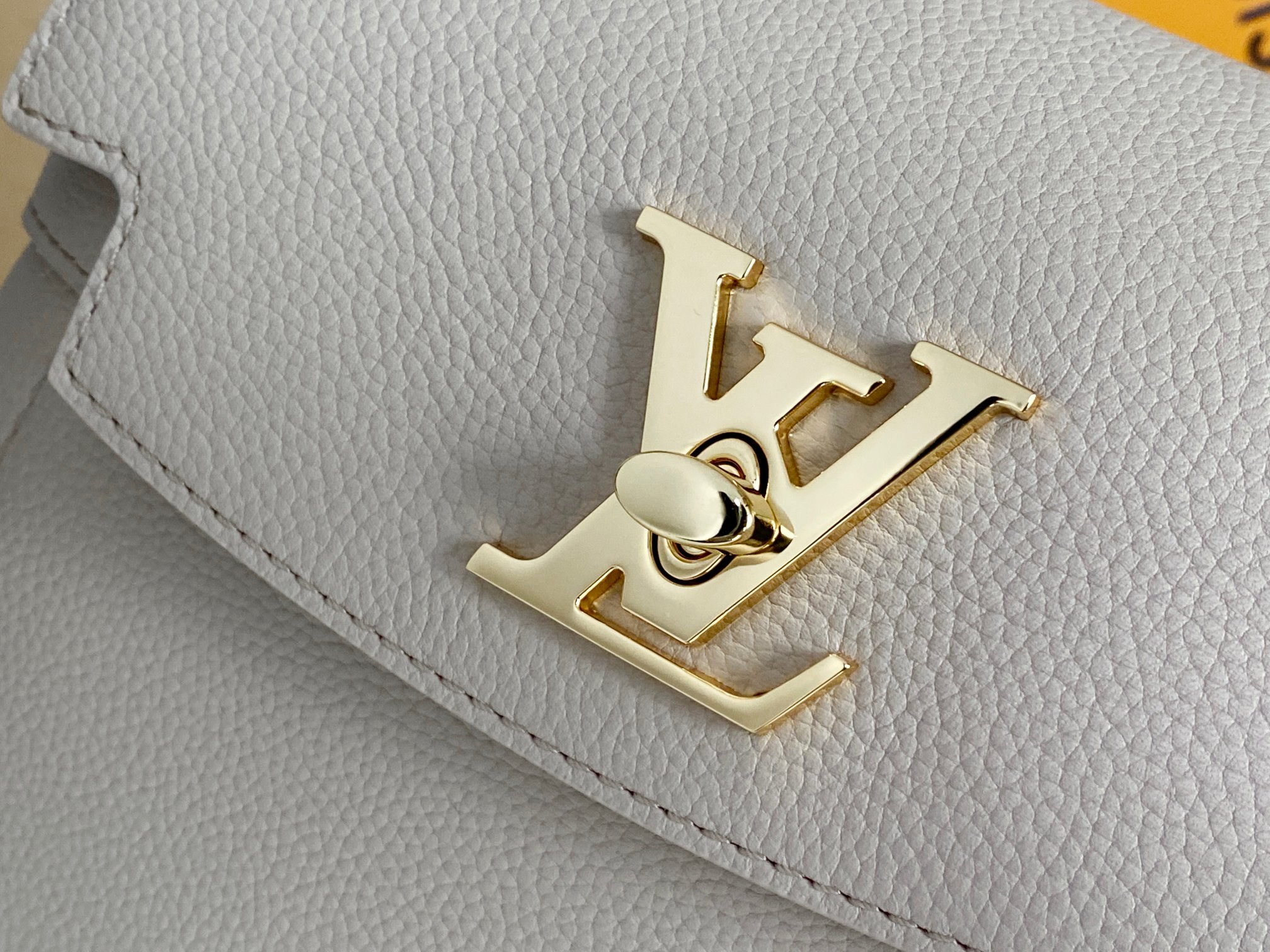 Louis Vuitton M21052 LockMe Ever Mini Greige Grained calf leather