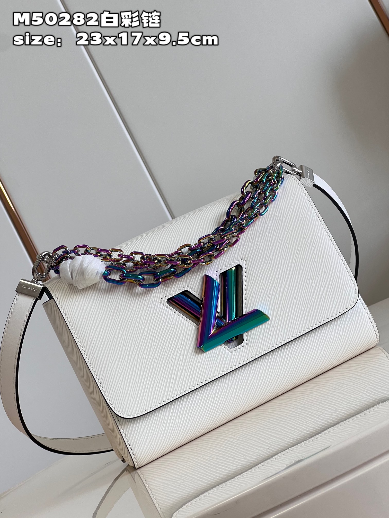 Louis Vuitton M22029 Twist PM Epi Grained Leather with an iridescent Triple Chain White