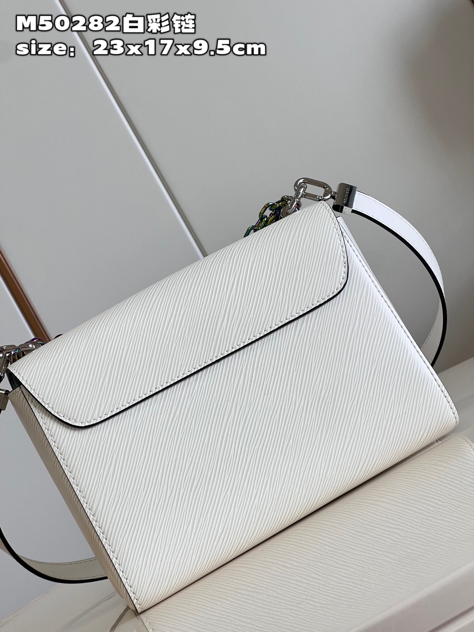 Louis Vuitton M22029 Twist PM Epi Grained Leather with an iridescent Triple Chain White