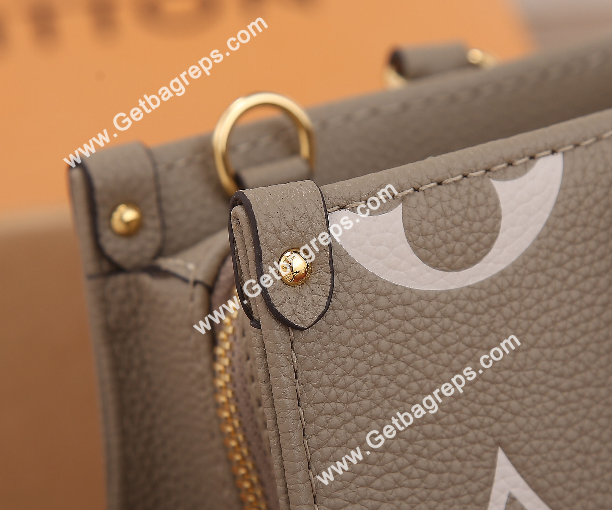 Louis Vuitton M23641 OnTheGo East West Embossed Grained Cowhide Leather Cream