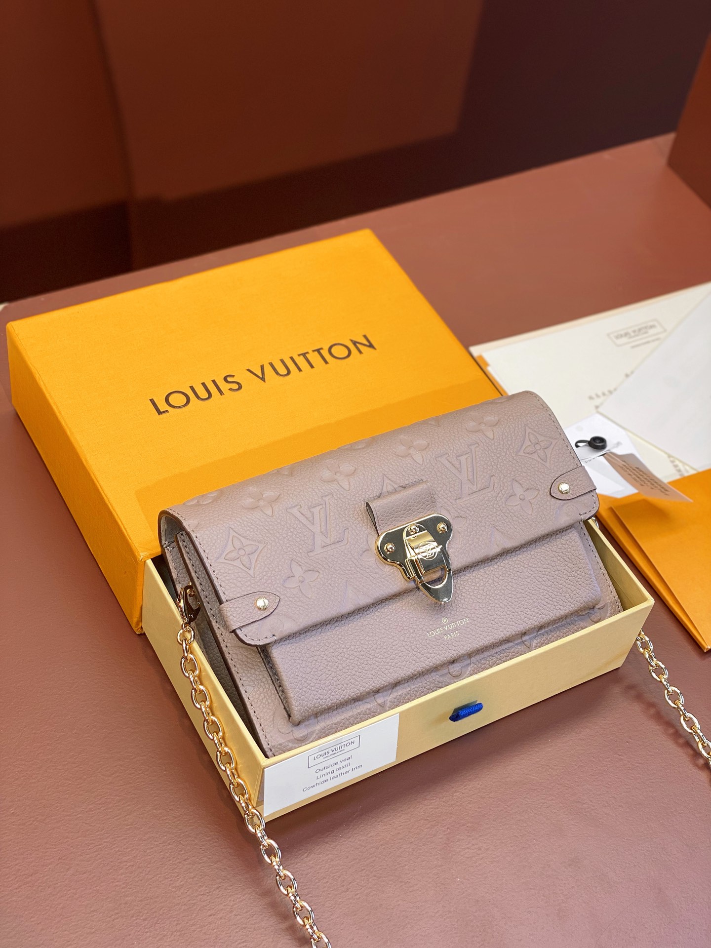 Louis Vuitton M67423 Vavin Chain Wallet Embossed cowhide leather Turtledove