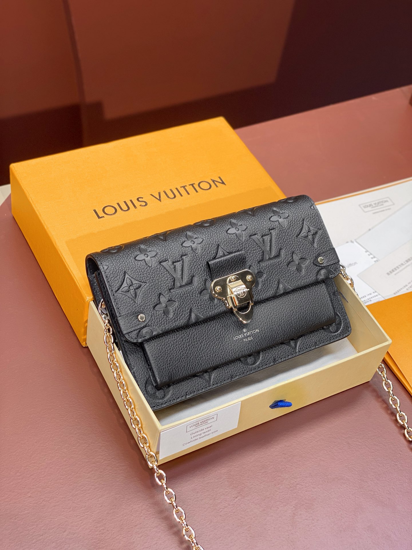 Louis Vuitton M67839 Vavin Chain Wallet Embossed cowhide leather Black