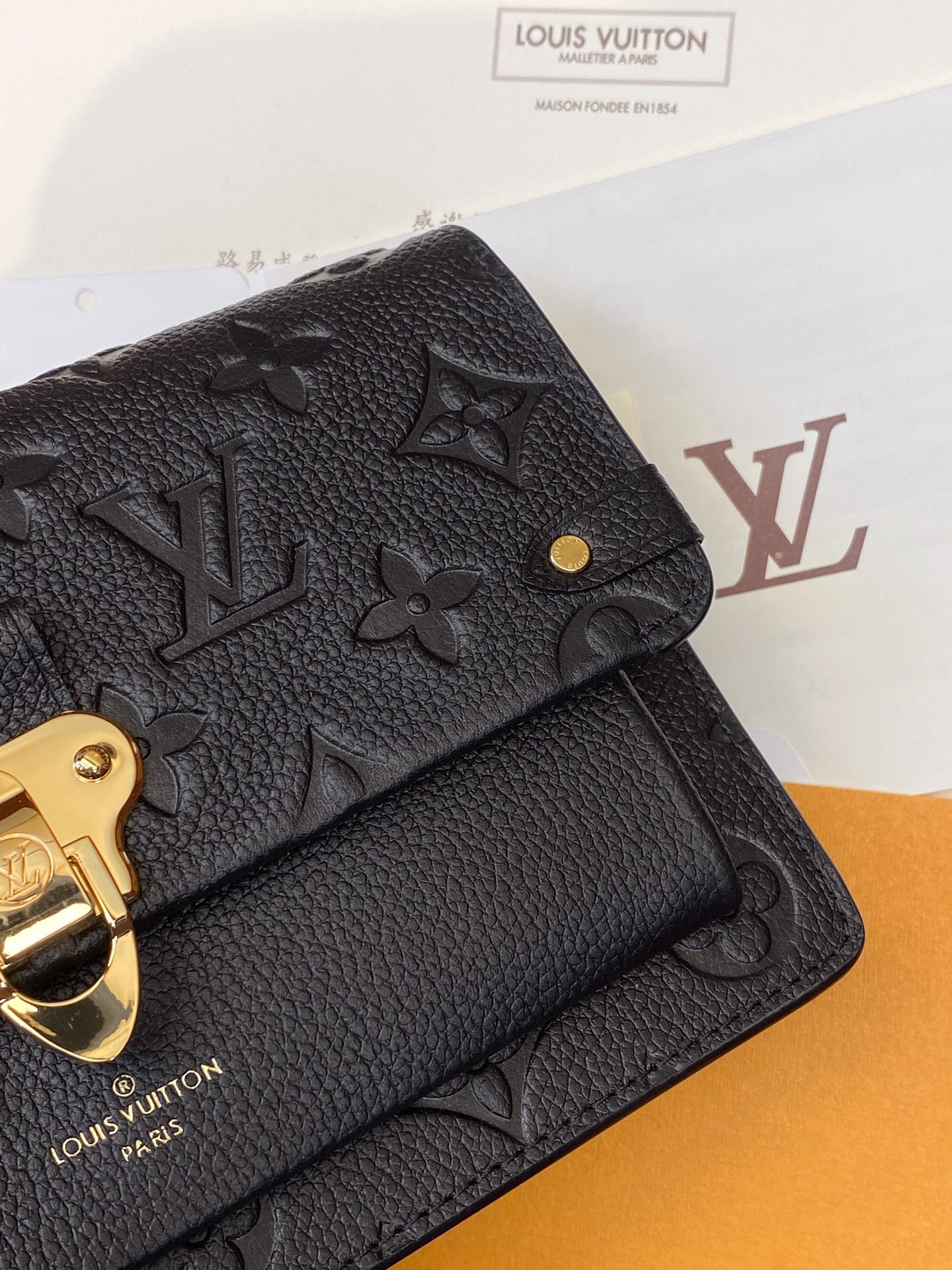 Louis Vuitton M67839 Vavin Chain Wallet Embossed cowhide leather Black