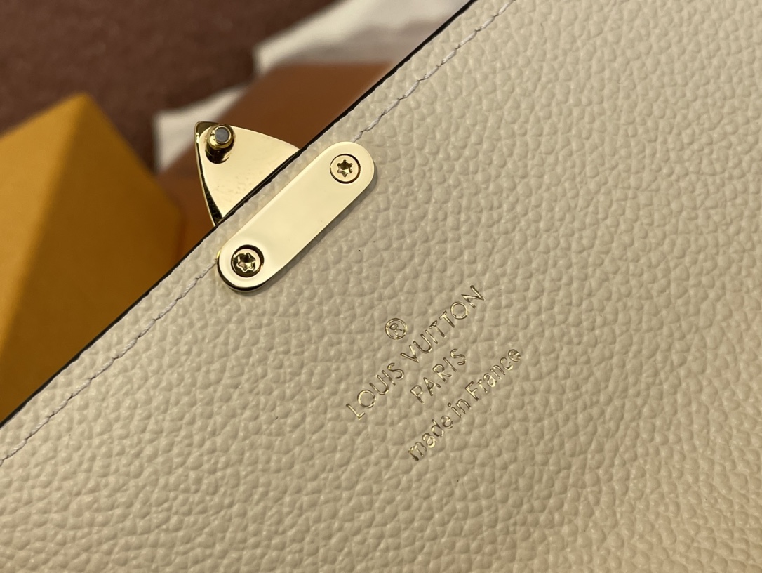 Louis Vuitton M83276 Sarah Wallet Monogram Empreinte embossed supple grained cowhide leather Creme