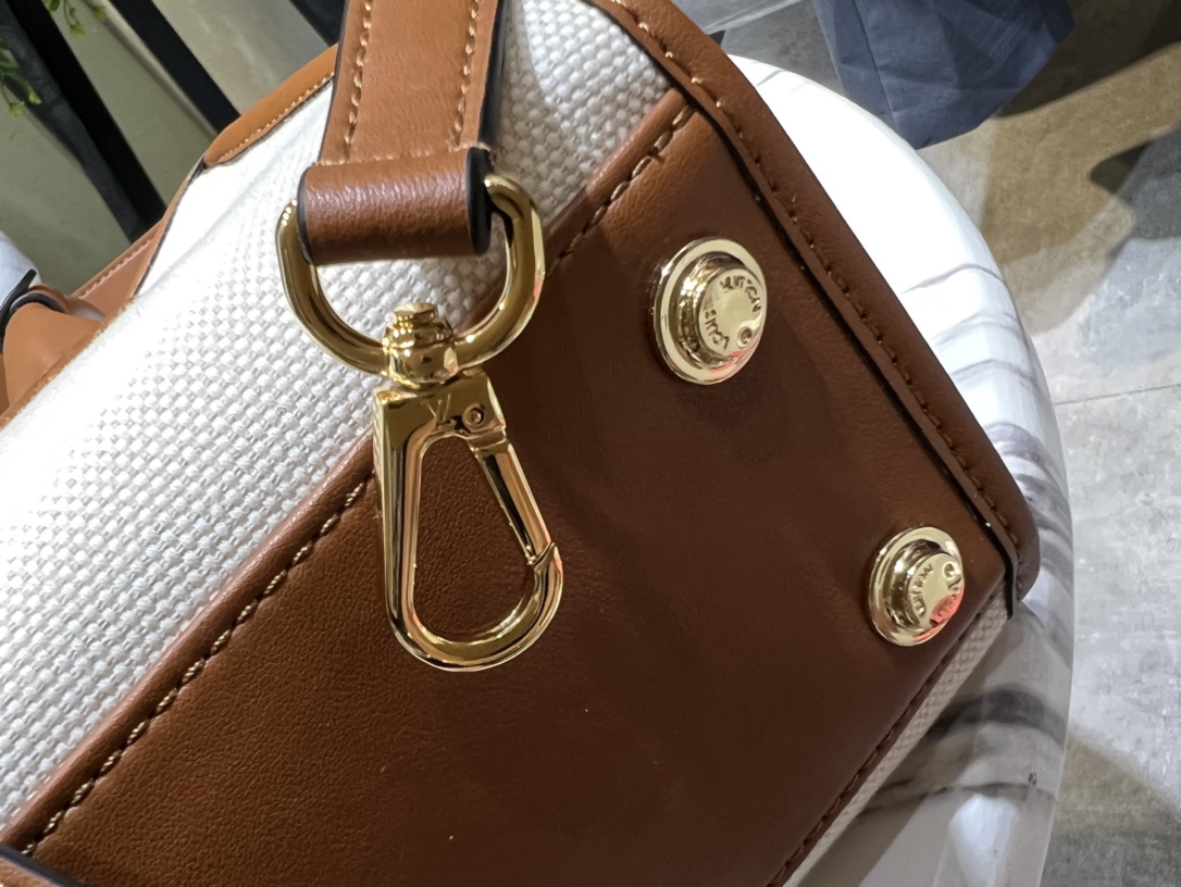 Louis Vuitton On My Side PM Bag In Canvas Brown M59905