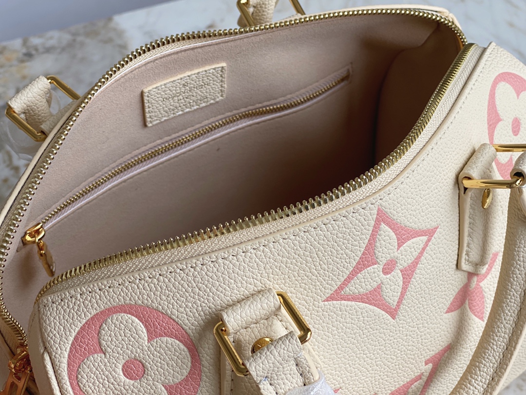 Louis Vuitton Speedy Bandouliere 25 Handbag Creme and Rose Embossed Supple Grained Cowhide Leather