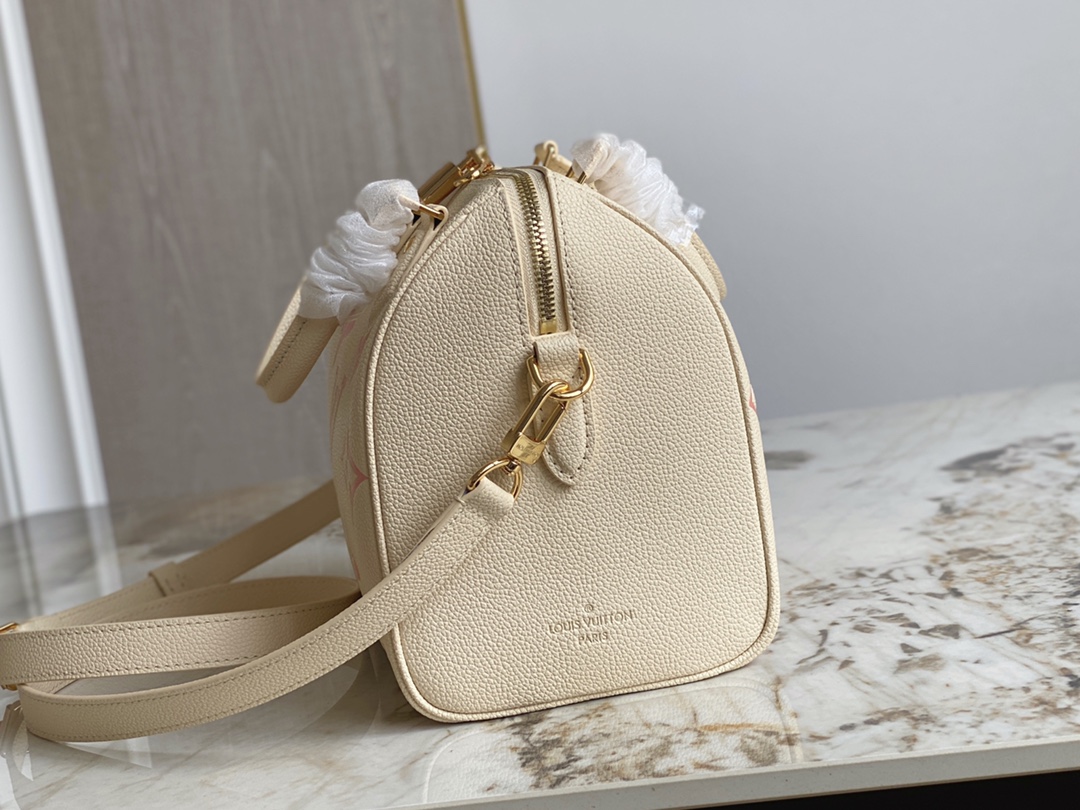 Louis Vuitton Speedy Bandouliere 25 Handbag Creme and Rose Embossed Supple Grained Cowhide Leather