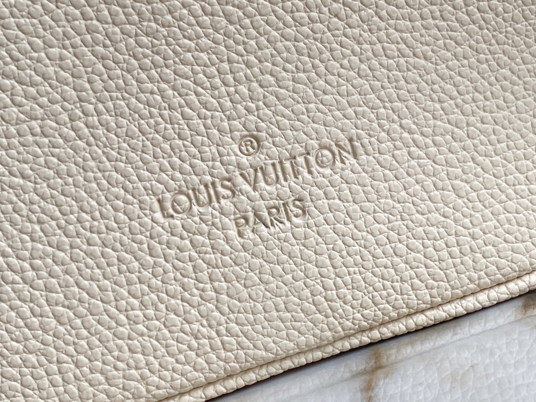 Louis Vuitton Speedy Bandouliere 25 Handbag Creme and Rose Embossed Supple Grained Cowhide Leather