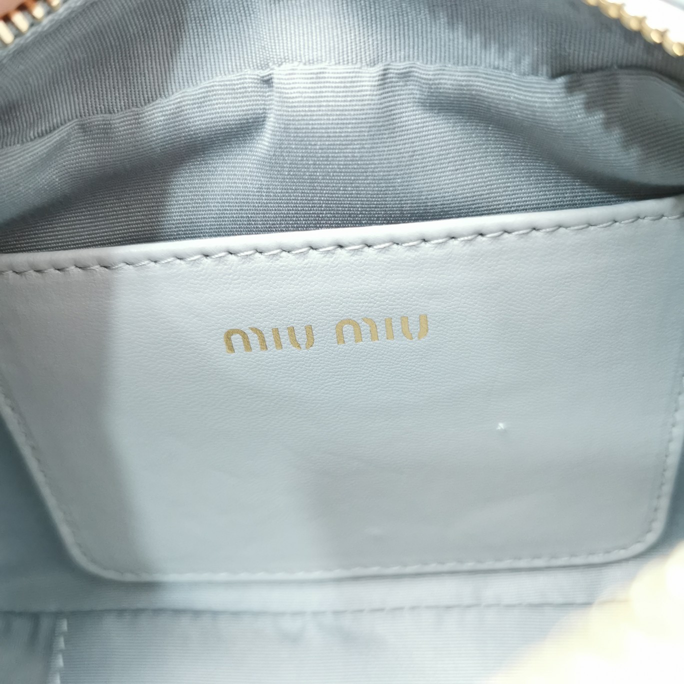 MiuMiu 5BP077 Matelasse Nappa Leather Top-Handle Mini-bag Blue