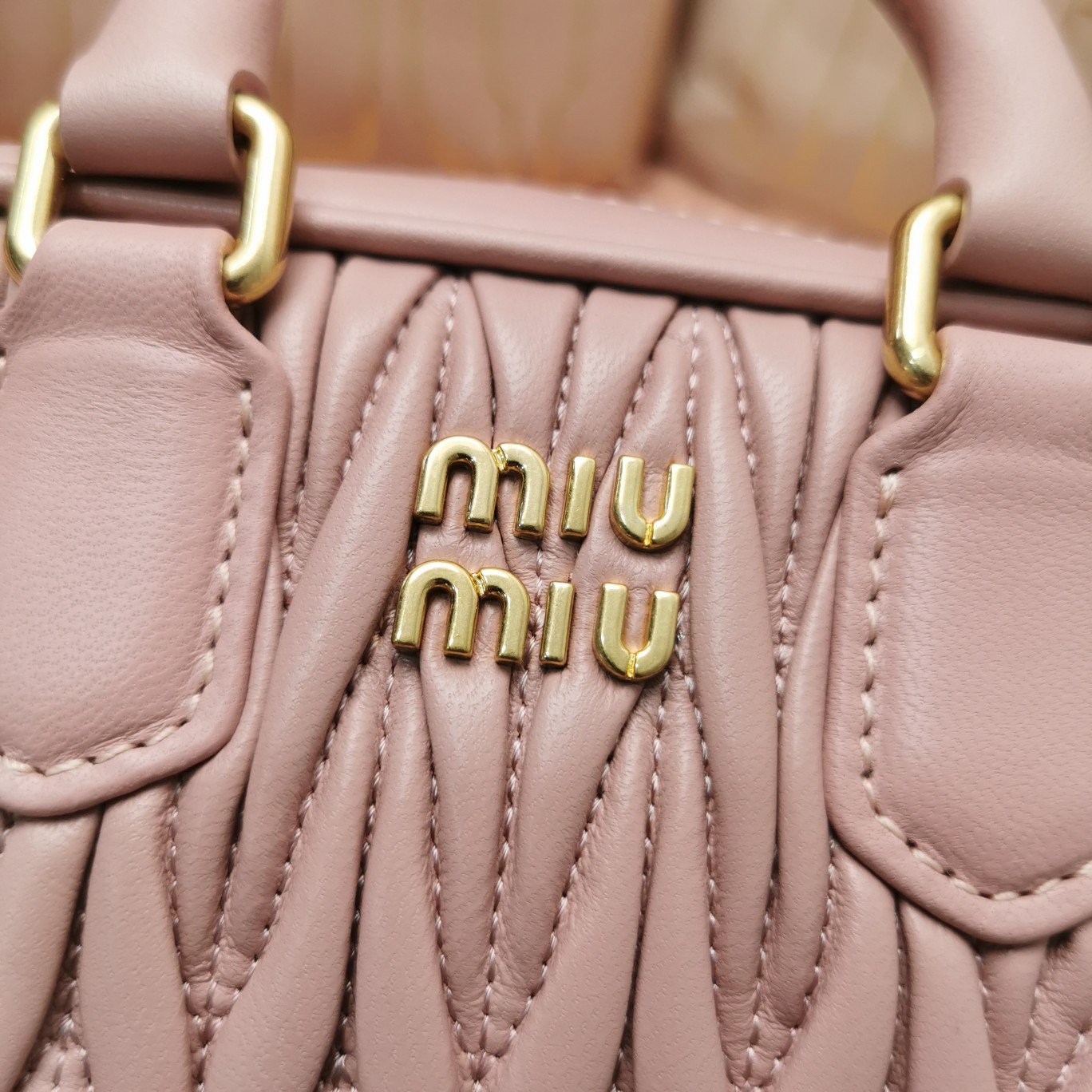 MiuMiu 5BP077 Matelasse Nappa Leather Top-Handle Mini-bag Pink