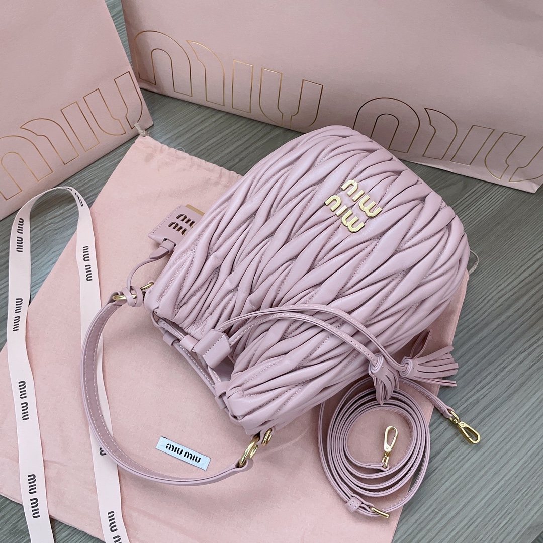 MiuMiu Matelasse nappa bucket bag drawstring closure Pink