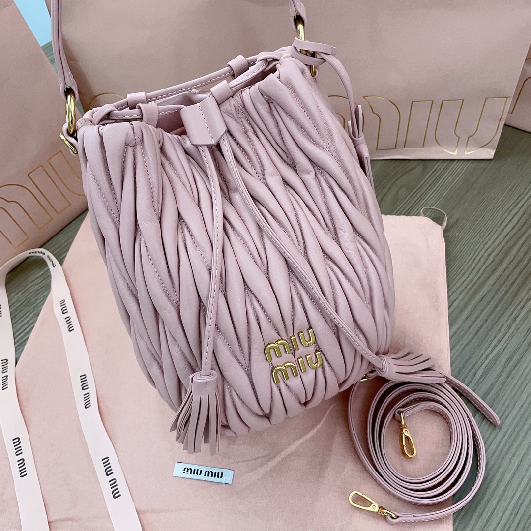 MiuMiu Matelasse nappa bucket bag drawstring closure Pink