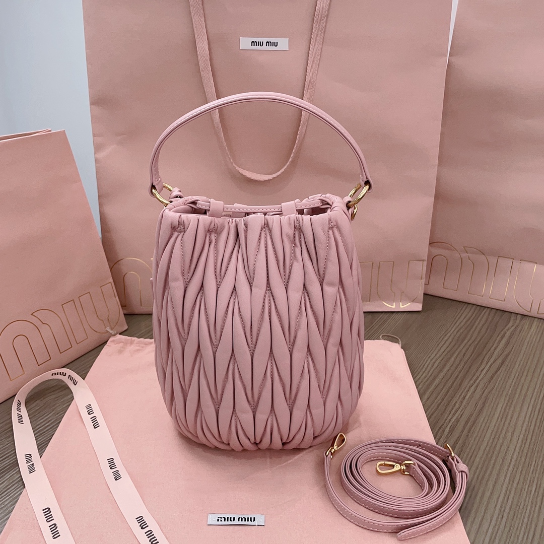 MiuMiu Matelasse nappa bucket bag drawstring closure Pink