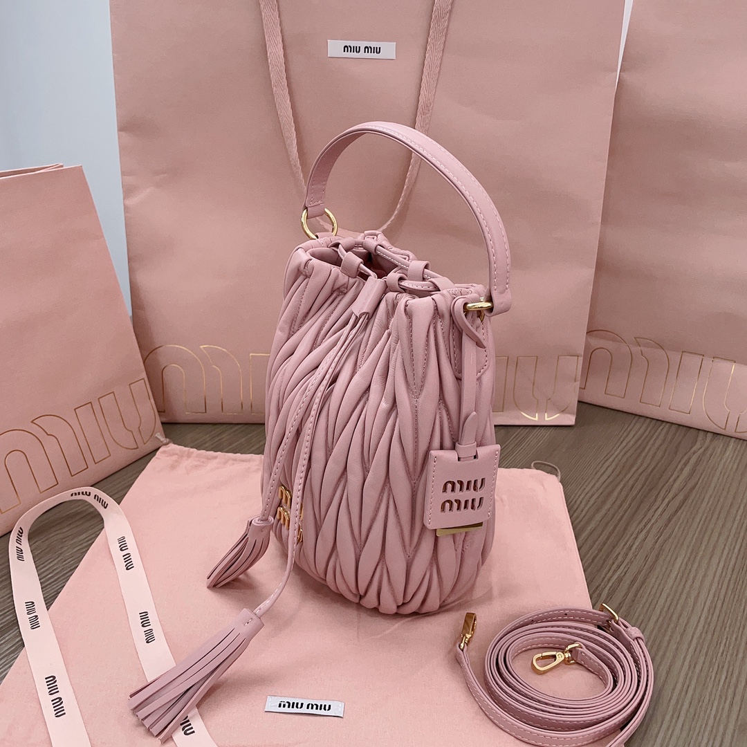 MiuMiu Matelasse nappa bucket bag drawstring closure Pink