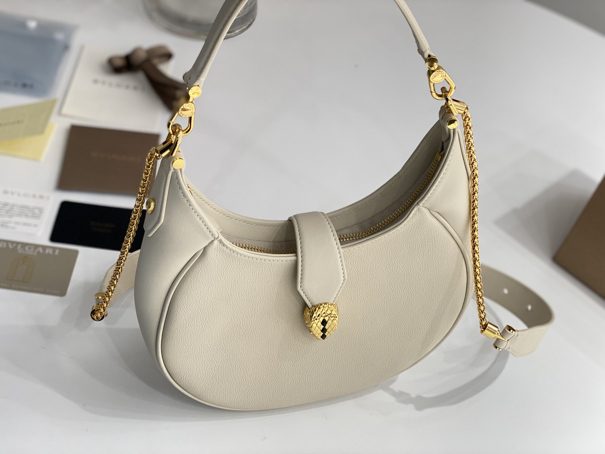 New Copy Bvlgari Serpenti Ellipse Crossbody Bag White Calf Leather with Snakehead Closure For Women 25cm