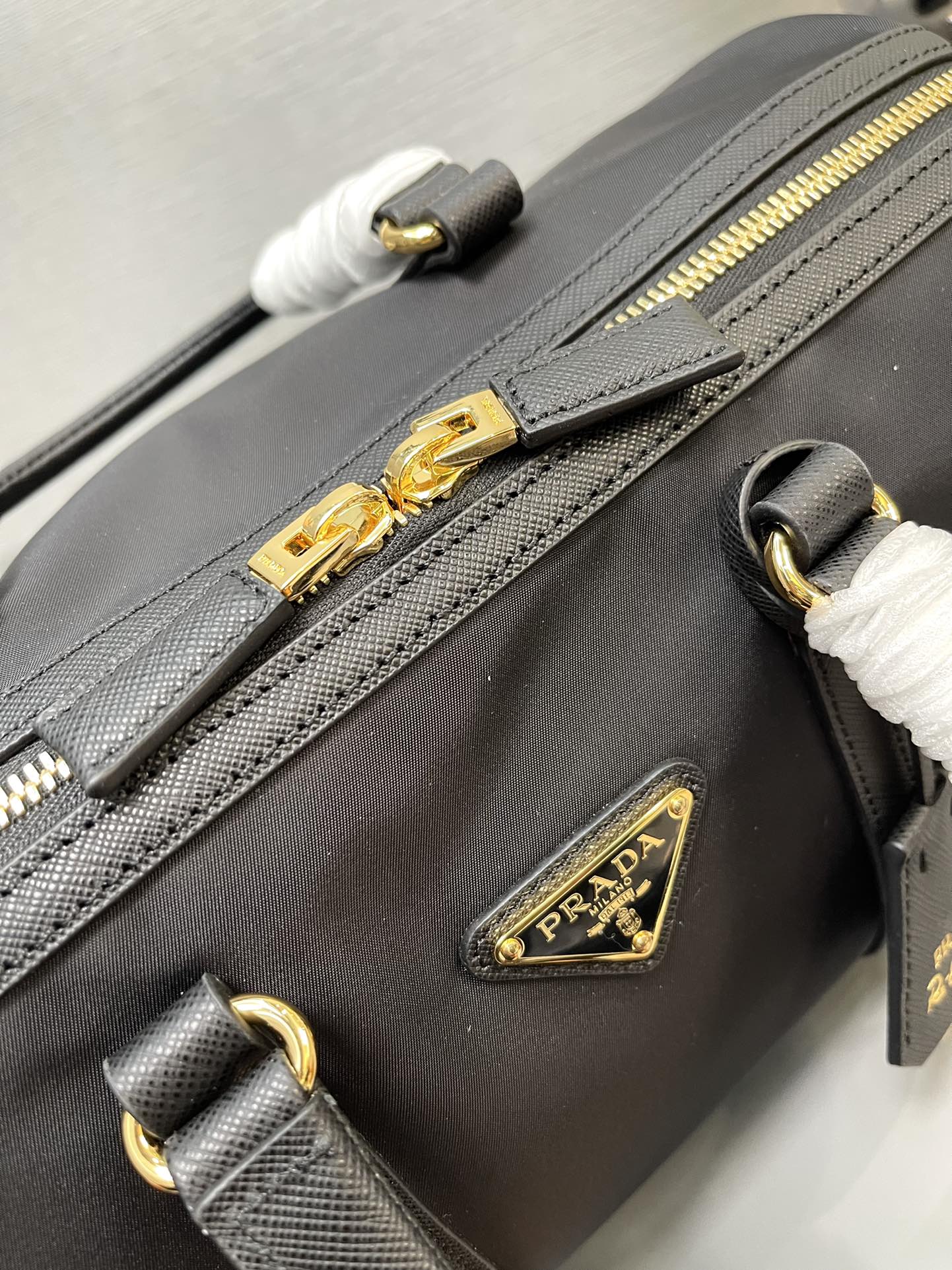 Prada 1BB233 Prada Re-Edition 1978 medium Re-Nylon and Saffiano leather top-handle bag Black